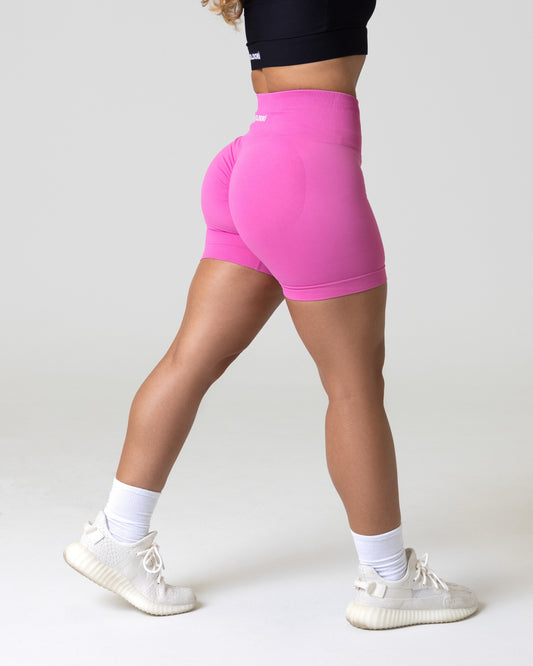 https://www.oloori.com/cdn/shop/products/A-woman-wearing-a-high-waisted-workout-shorts_533x.jpg?v=1660045864